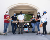 five females and two males working in the Golden Groceries at Senior Communities photo galleries